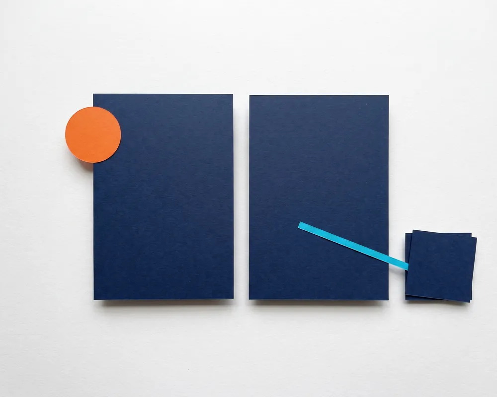 Two paper rectangles representing the two take-home resources